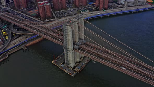 Brooklyn Bridge Traffic with View of Manhattan Skyline alt