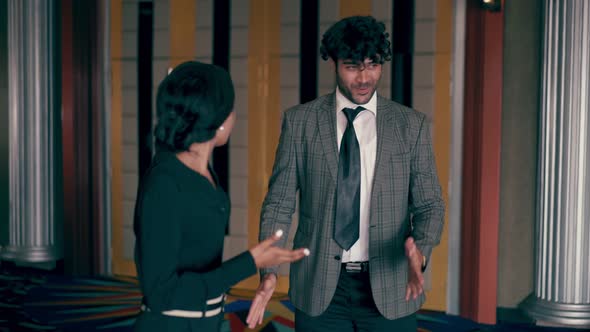 Man Wearing Suit is Dancing Like a Robot alt