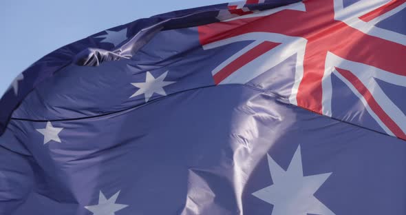 The national australian flag waving in the wind. alt