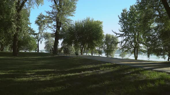 Male Training Near the River. alt