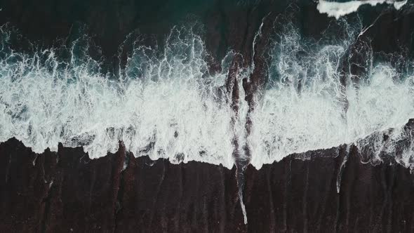 Waves Breaking Over a Shallow Reef