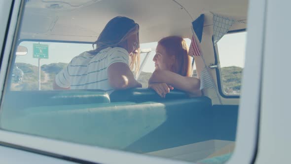 Camper van road trip by the sea alt