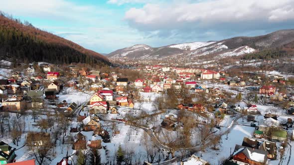 Aerial View of a Village in the Carpathian Mountains in Winter. Yaremche, Ukraine. alt