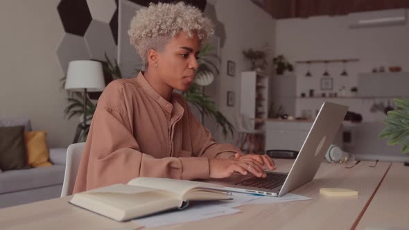 Serious Girl Study Online with Internet Teacher Learn Language Looking at Laptop alt