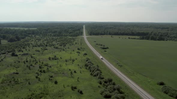 Asphalt road between forest in Ural