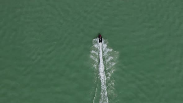 Aerial of popular water sport activity. Jet Ski on Utah Lake top down view alt