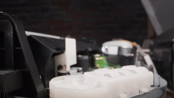 Video Recorder Puts Tape Into Cassette and Reads Information alt