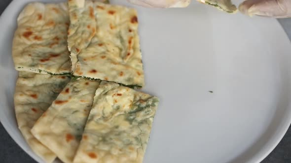Chef puts a national cake on the white plate alt
