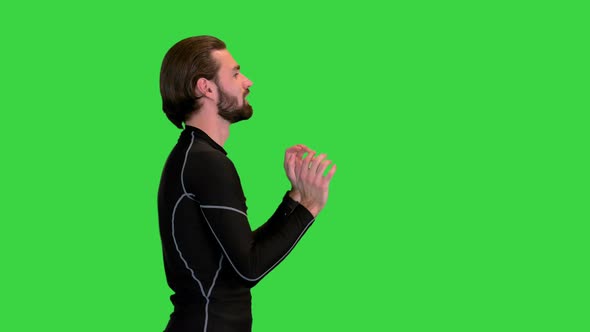 Male Volleyball Player Bouncing a Ball on a Green Screen Chroma Key