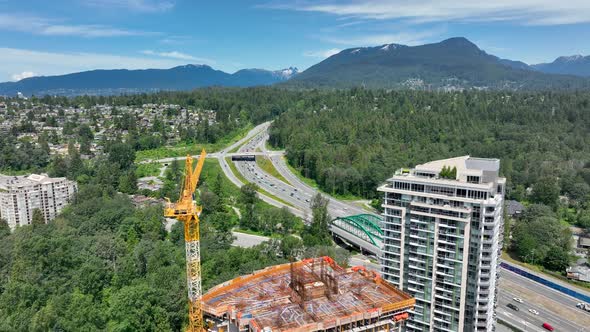 Lush Green Trees At The Park Near The Trans-Canada Highway In North Vancouver, Canada. - aerial alt