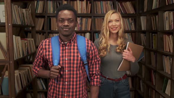 Closeup Mixed Race Students in Public Library alt