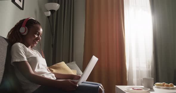 Black Female Watching Interesting Movie alt