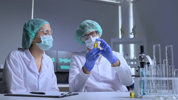 Caucasian researcher work in laboratory room of covid-19 vaccine and drug manufacturing company. alt