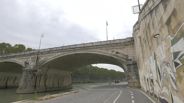 Umberto I Bridge seen from the Tiber riverside in Rome