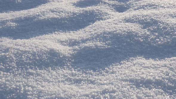 Frozen crystalline water snowflakes over the hill slow tilt 4K 3840X2160 UHD video - Sunrise over mo alt