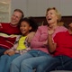 Carefree Grandparents and Joyful Multiethnic Children Watching Comedy Show on Tv - VideoHive Item for Sale