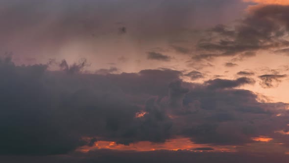 Sunset Cloudy Sky With Fluffy Clouds alt