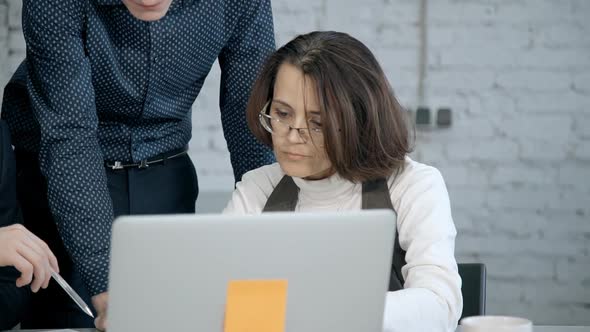 Mature Woman Working with Employee Manager Man on New Startup Pr