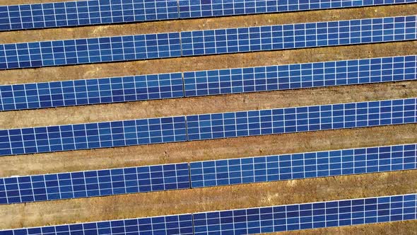 Aerial Drone View Flight Over Solar Power Station Panels alt