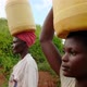 African Women Carry Drinking Water From - VideoHive Item for Sale