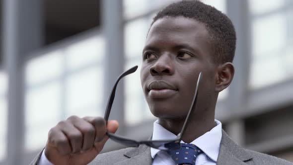 challenge, future, success.successful African black businessman wearing sunglass alt