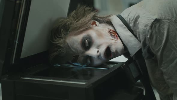 Zombie Office Worker Photocopying his Face alt