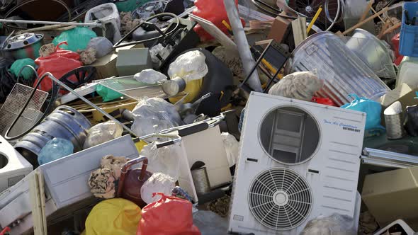 Loopable animation with the rubbish dump. Dirty plastic, metal and paper garbage alt