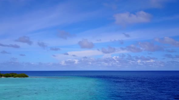 Aerial drone travel of coast beach by blue sea and sand background alt