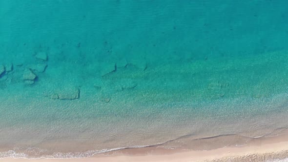 Aerial Top View On The Beach. Natural Pool alt