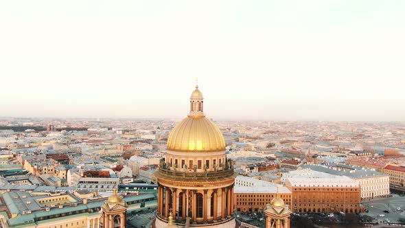 Drone Rises Above St. Isaac's Cathedral in the Historical Center of St. Petersburg at Sunset alt