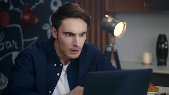 Business Man Getting Bad Results on Computer at Home. Shocked Guy Feeling Upset alt