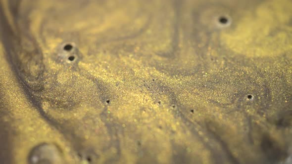 Gold Paint Particles Rotation Background