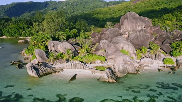 Aerial Drone Footage of the Tropical and Beautiful Anse Source D'argent Beach in the Seychelles alt
