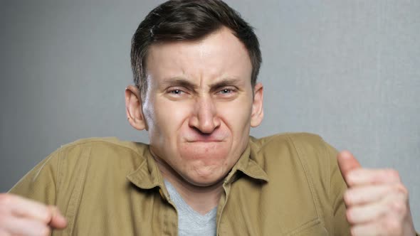 Close Up of Angry Man Screaming alt