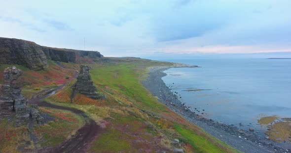 Dva Brata Rock. Sredniy Peninsula, Russia. Aerial alt