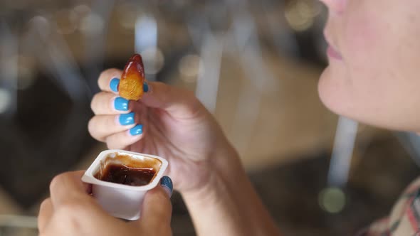 Woman Eating French Fries with Tomato Sauce, Harmful and Tasty Fast Food, Close Up.