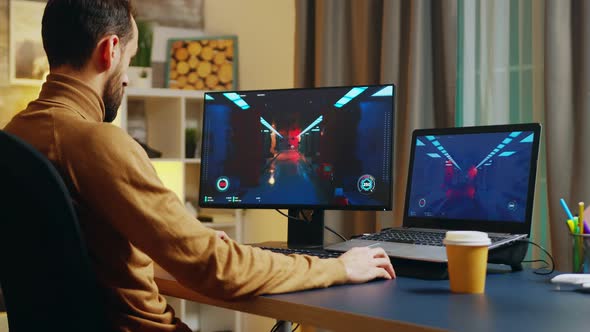 Engineer Playing Video Games at Home on Computer alt