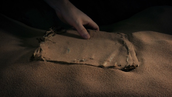 Ancient Book Picked Up From The Sand In Cave alt