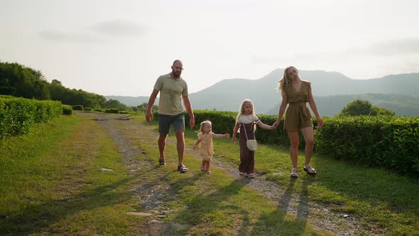 Kids and Parents Enjoying Time Together Outdoors alt
