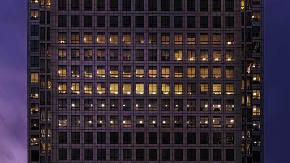 Day to night of a large office building time lapse