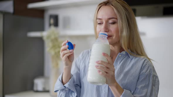 Pregnant Woman Smelling Milk Making Disgust Facial Expression alt