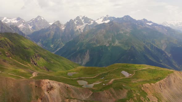 Koruldi Lakes And Caucasus Mountains. Static Left To Right Pan alt