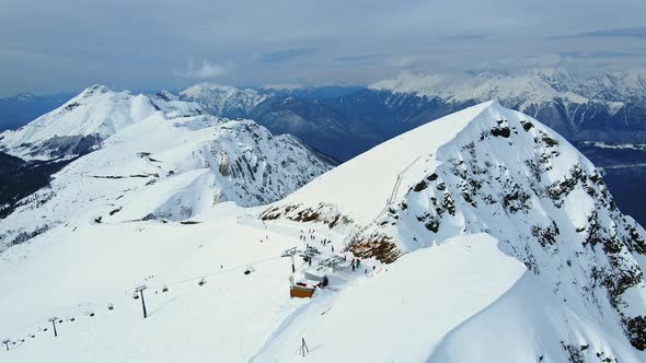 Aerial View of the Slope of the Rosa Khutor Ski Resort and Black Pyramid Peak alt
