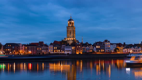 Day to Night Time Lapse with clouds and St Lebuïnus Church in Deventer, Overijssel, The Netherlands alt