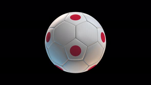 Soccer ball with flag Japan, on black background loop alpha