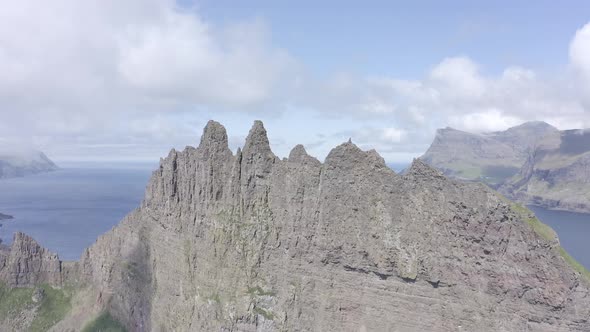 Aerial Drone View on Drangarnir Sea Stack in the Atlantic Ocean on the Faroe Islands alt