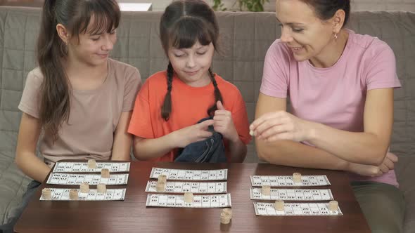 Lotto cards on table.  alt