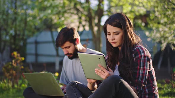 Charismatic Woman and Guy While Sitting on the alt