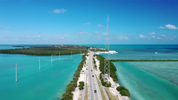 Cars Driving Through Overseas Highway Spanning The Florida Keys In USA. - aerial alt