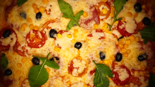 Pizza Close-up. Delivery of Products. Pizza with Cheese, Tomatoes and Olives